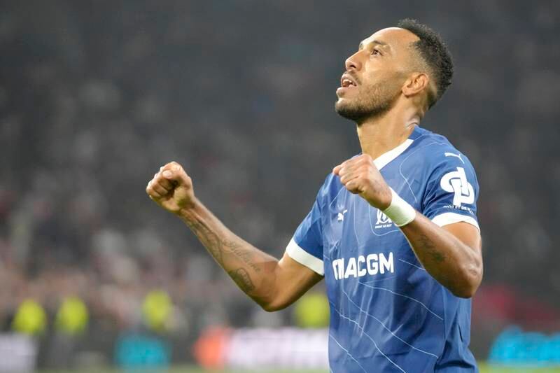 Marseille's Pierre-Emerick Aubameyang celebrates after scoring his side's third goal against Ajax. AP