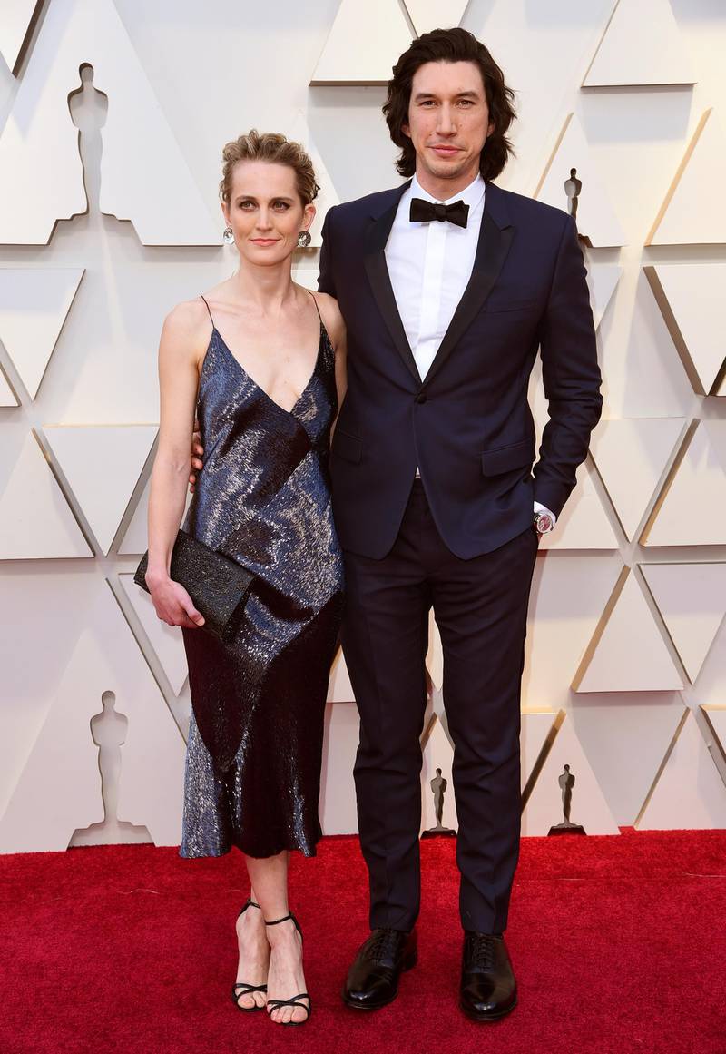 Joanne Tucker, left, and Adam Driver in Dior Homme at the 91st Academy Awards. AP