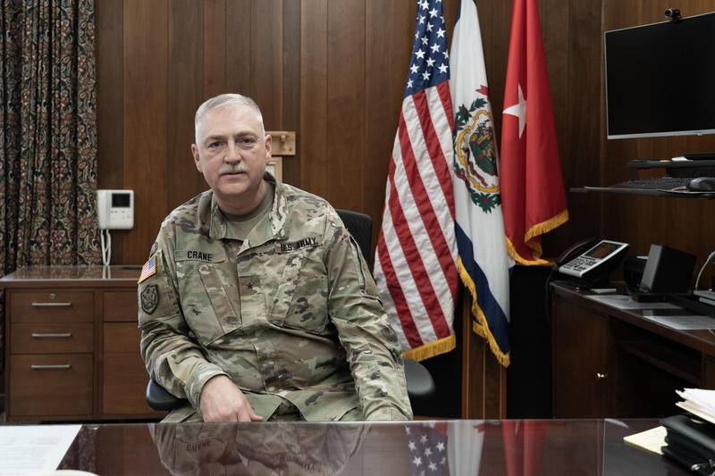 Brig Gen Bill Crane, head of the West Virginia National Guard, at his desk. Willy Lowry / The National