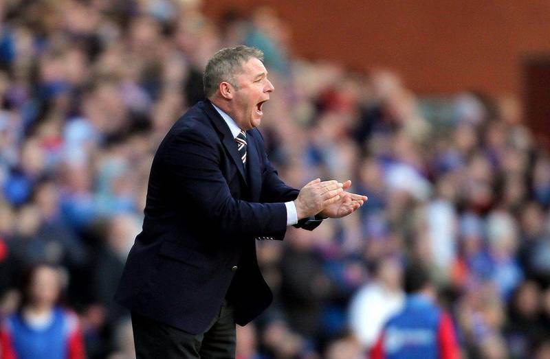 Ally McCoist has managed Rangers to 10 wins, two draws and four losses in the Scottish Championship this season. Ian MacNicol / AFP