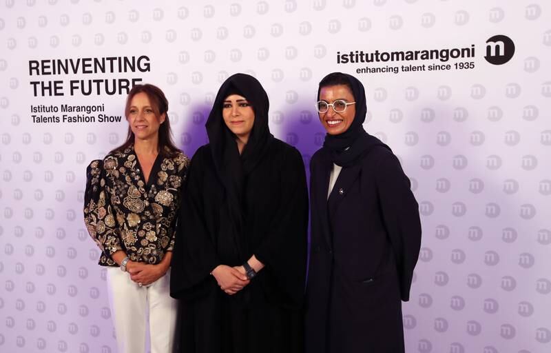Sheikha Latifa bint Mohammed, chairwoman of Dubai Culture and Arts Authority and member of the Dubai Council, centre, with Noura Al Kaabi, Minister of Culture and Youth, right; and Stefania Valenti, managing director of Istituto Marangoni, at the fashion show held to launch the Dubai outpost of the school. EPA