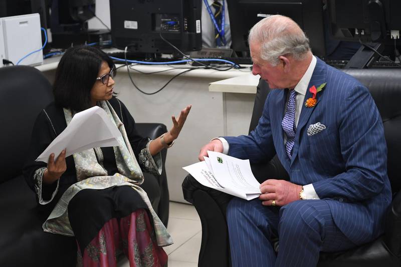 Prince Charles speaks with Indian environmentalist Sunita Narain. AFP