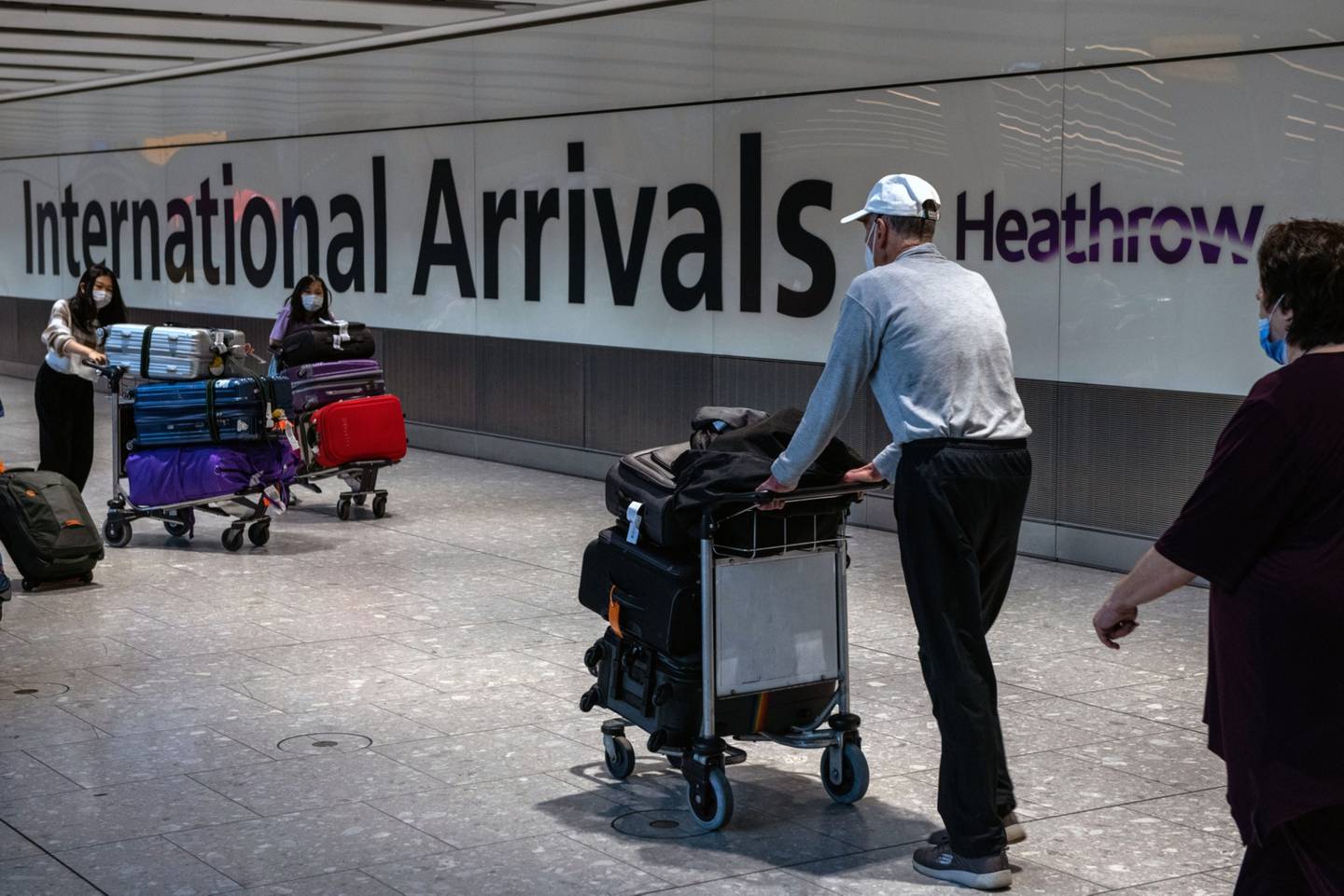 Passengers in the arrivals hall of Terminal 5 at London Heathrow Airport in London, UK, on Monday. Bloomberg 