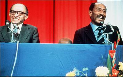 Photo taken on 20 November 1977 of Egyptian President Anwar Sadat (R) during a joint press conference he gave with Israeli Prime Minister Menachem Begin during his historic visit to Israel. - His widow Jihane said in an interview broadcast on Israeli television on 19 November that her husband "knew he was going to die, but that did not change his mind in his peace endeavor". Anwar al-Sadat's visit to Israel led fifteen months later to the signing of the first peace treaty between Israel and an Arab country. In October 1981, Sadat was assassinated in Cairo by Islamists. (Photo by - / AFP)