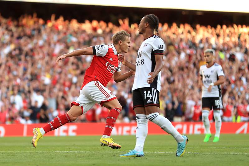 Arsenal's Martin Odegaard celebrates scoring against Fulham. PA