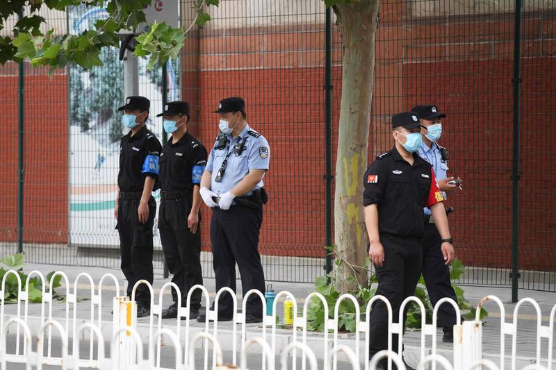 Chinese police and security personnel stand outside the Indian embassy in Beijing. Beijing's state media on June 17 played down a deadly border confrontation between Chinese and Indian troops and did not reveal casualties on its side even as social media users urged retaliation. The Indian army said Tuesday that 20 of its soldiers were killed in a "violent face-off" along the Himalayan frontier on June 16, which resulted in "casualties on both sides".  AFP