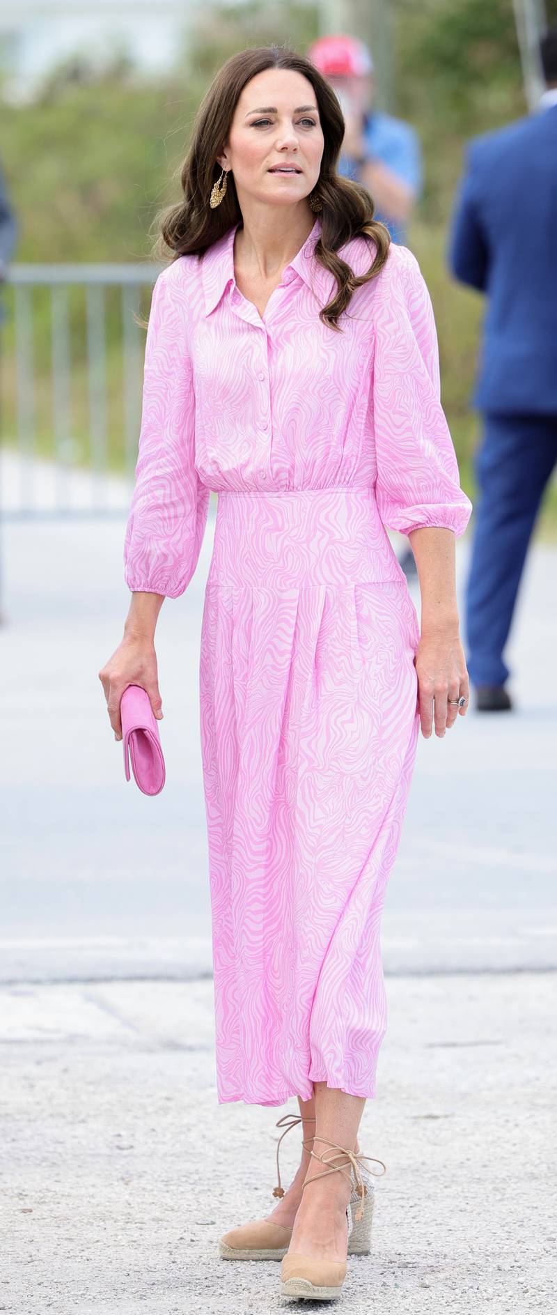 The Duchess of Cambridge, in a pink Rixo dress, visits Daystar Evangelical Church Abaco in The Bahamas on March 26. PA 