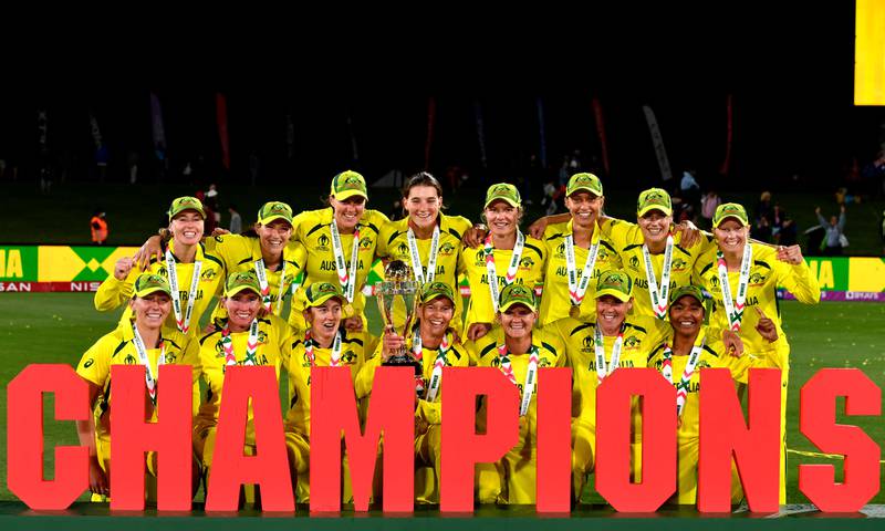 Australian celebrate with the trophy after the 2022 Women's Cricket World Cup final match against England at the Hagley Park Oval in Christchurch on April 3, 2022. AFP