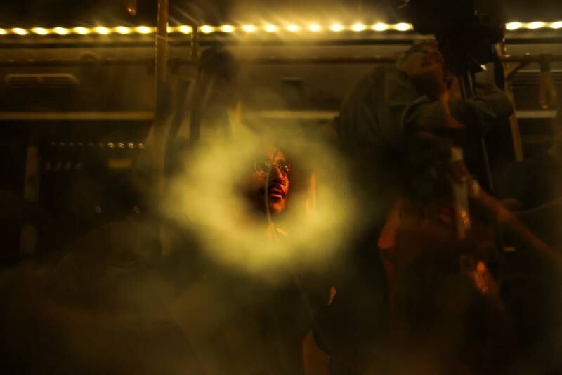 A hole in a shattered window of a bus after an incident in Jerusalem. Reuters
