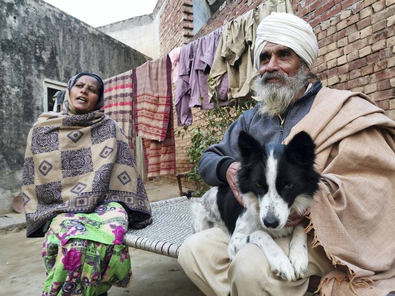 Kulwant Kaur, 40, is elated with her husband Balbir Singh’s return from the protest site at Singhu border near Delhi. She had been taking care of the livestock and farms alone in absence of Mr Singh.  Taniya Dutta for The National