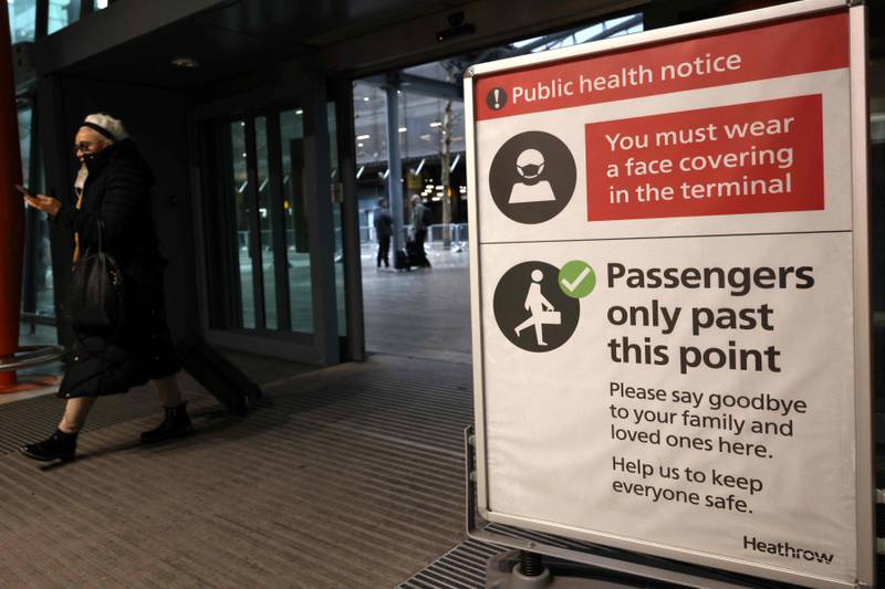 Information signs are displayed at Heathrow as new restrictions on travellers are introduced. AFP