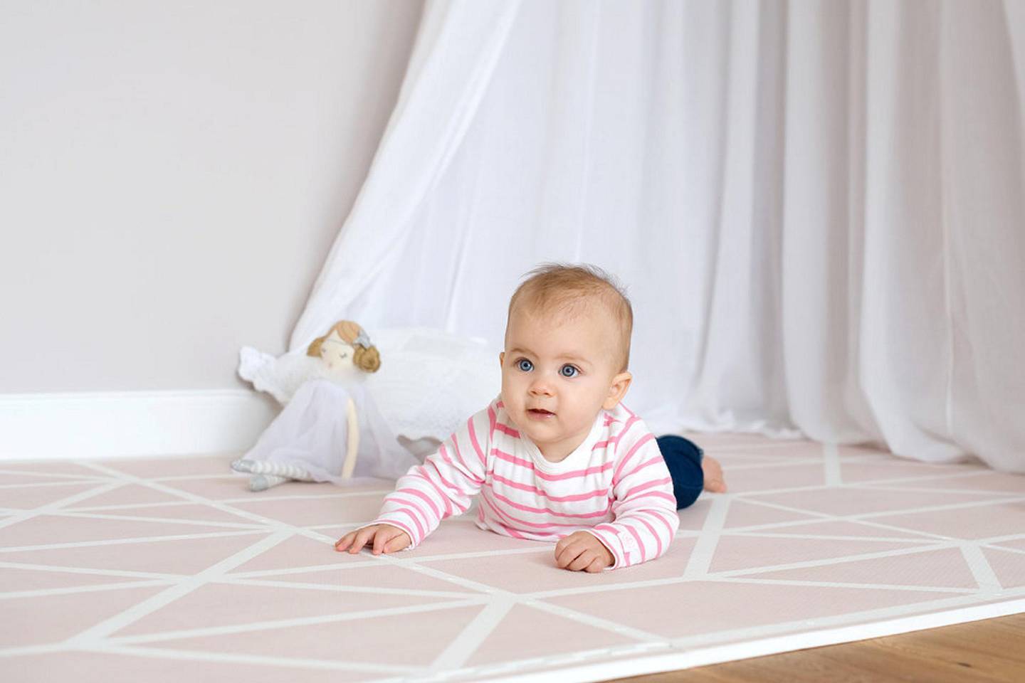 Babies can roll over on their tummies between 3 and 6 months. Courtesy Babysouq