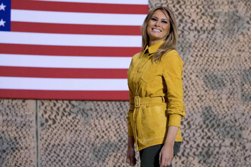 First lady Melania Trump smiles as she steps away from the podium after speaking alongside President Donald Trump at a hanger rally at Al Asad Air Base, Iraq. AP Photo