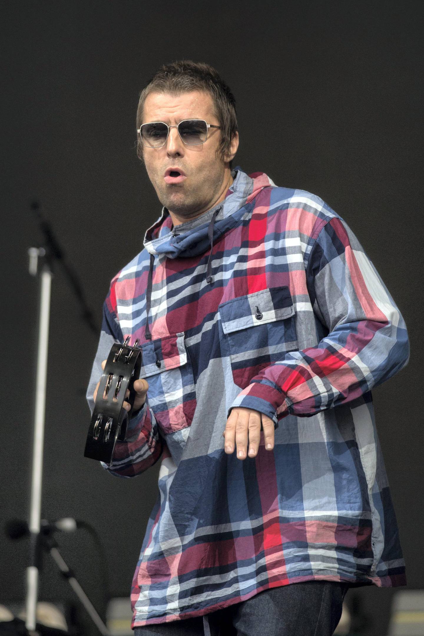 British singer Liam Gallagher performs on the Pyramid Stage at the Glastonbury Festival of Music and Performing Arts on Worthy Farm near the village of Pilton in Somerset, South West England, on June 29, 2019. (Photo by Oli SCARFF / AFP)