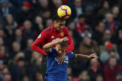 Manchester United's Chris Smalling in action with Richarlison. Action Images via Reuters