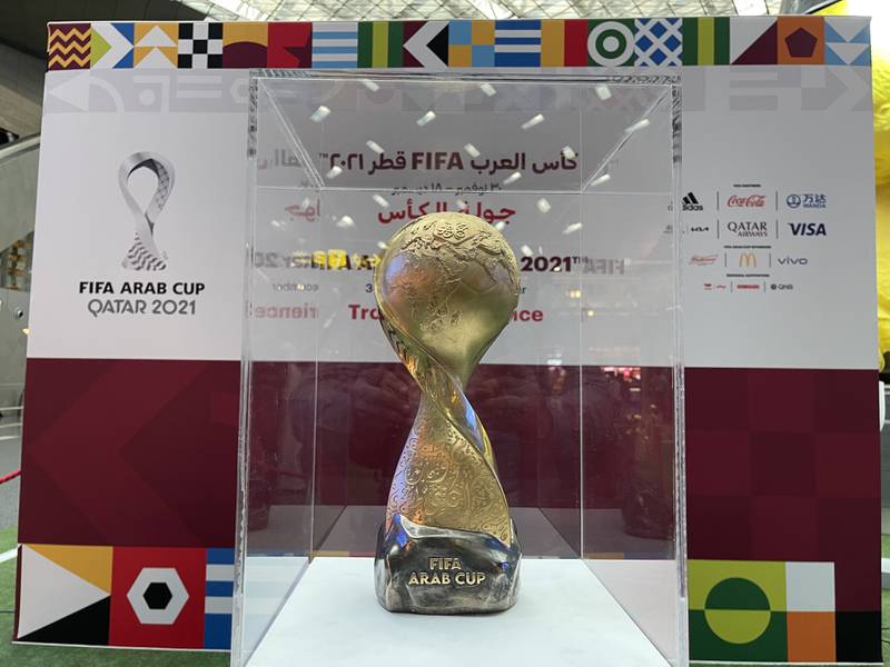 The Fifa Arab Cup trophy is displayed at the Hamad International Airport in Doha.