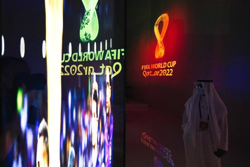 A Qatari walks through the pavilion as it advertises the upcoming FIFA 2022 World Cup at Expo 2020 Dubai. AP Photo / Jon Gambrell
