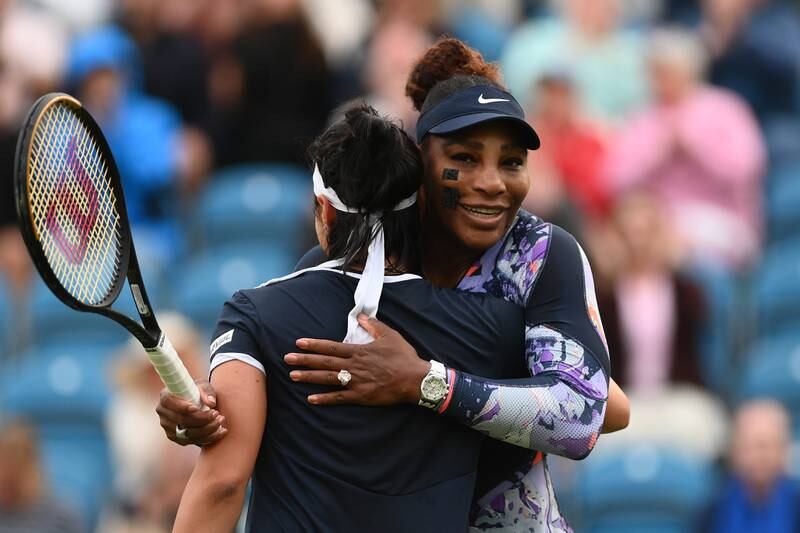Serena Williams embraces Ons Jabeur of Tunisia after her doubles win in Eastbourne. Getty