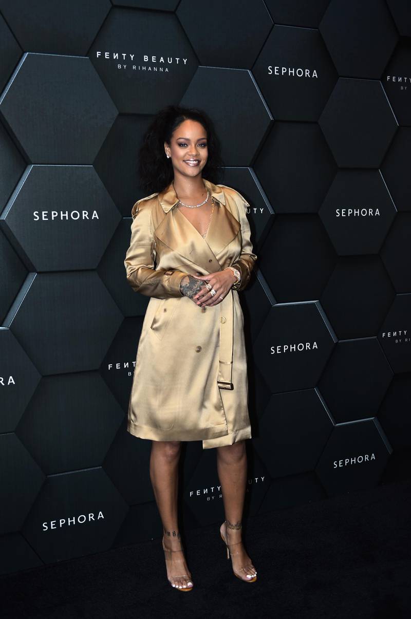 DUBAI, UNITED ARAB EMIRATES - SEPTEMBER 29:  Rihanna poses during her Fenty Beauty talk in collaboration with Sephora, for the launch of her new Stunna Lip paint "Uninvited" on September 29, 2018 in Dubai, United Arab Emirates.  (Photo by Mark Ganzon/Getty Images for Fenty Beauty)