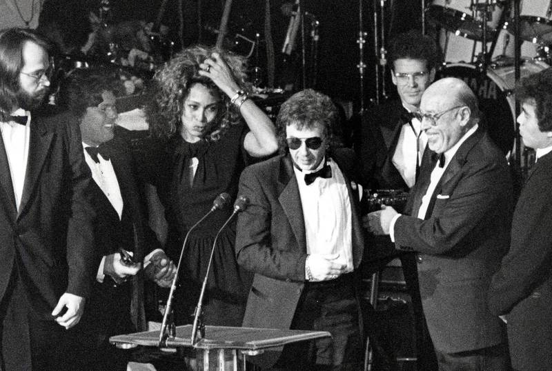 4th Annual Rock and Roll Hall Of Fame Awards - 18 January, 1989. Tina Turner, Phil Spector, and Ahmet Ertegun at the Waldorf Hotel in New York City, New York (Photo by Ron Galella/Ron Galella Collection via Getty Images)