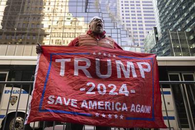 A supporter of former President Donald Trump protests outside Trump Tower in New York. AP Photo