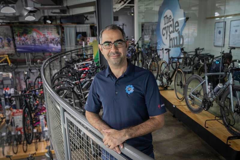 Sam Sayadan, co-founder of The Cycle Hub Shop, said cycling is a year-round activity, but interest piques in the cooler months.  Antonie Robertson / The National
