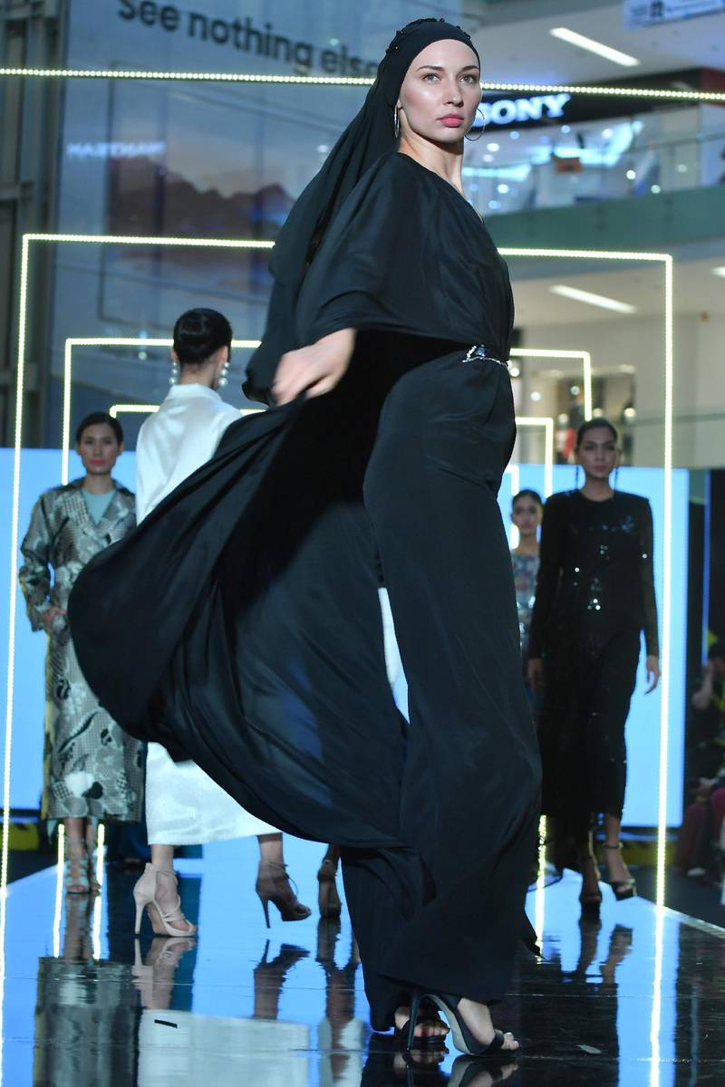 Black was a predominant colour on the Jakarta catwalk, as seen on this look by designer Araida of Russia. AFP