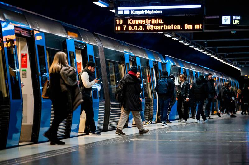 Daily commuters arrive on the metro at Stockholm's central station. AFP