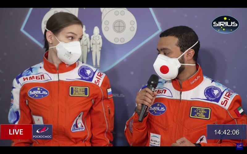 Saleh Al Ameri and a fellow team member during a pre-isolation interview.