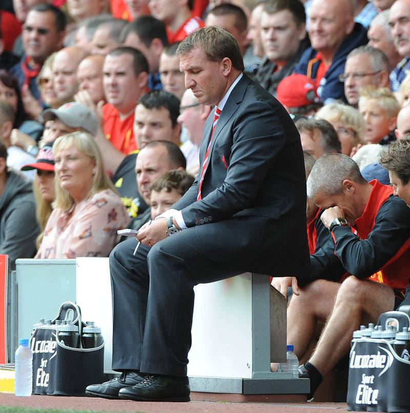 epa03380264 Liverpool's manager Brendan Rodgers reacts during the English Premier League soccer match Liverpool vs Arsenal at Anfield in Liverpool, Britain, 02 September 2012.  EPA/PETER POWELL DataCo terms and conditions apply.  http//www.epa.eu/downloads/DataCo-TCs.pdf *** Local Caption ***  03380264.jpg