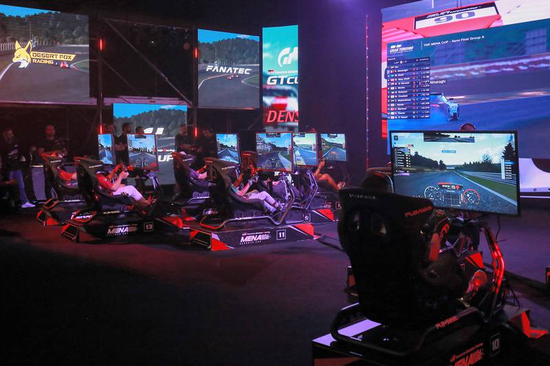 Virtual cars whizzed by, their engines roaring, as 26 drivers vied for the top spot, dreaming one day of sitting behind the wheel of real-life race cars.
