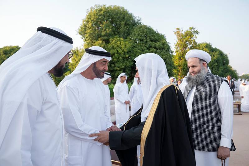 AL AIN, UNITED ARAB EMIRATES - December 09, 2019: HH Sheikh Mohamed bin Zayed Al Nahyan, Crown Prince of Abu Dhabi and Deputy Supreme Commander of the UAE Armed Forces (2nd L), greets a participant of the Forum for Promoting Peace in Muslim Societies during Al Maqam Palace barza.

( Hamad Al Kaabi / Ministry of Presidential Affairs )​
---