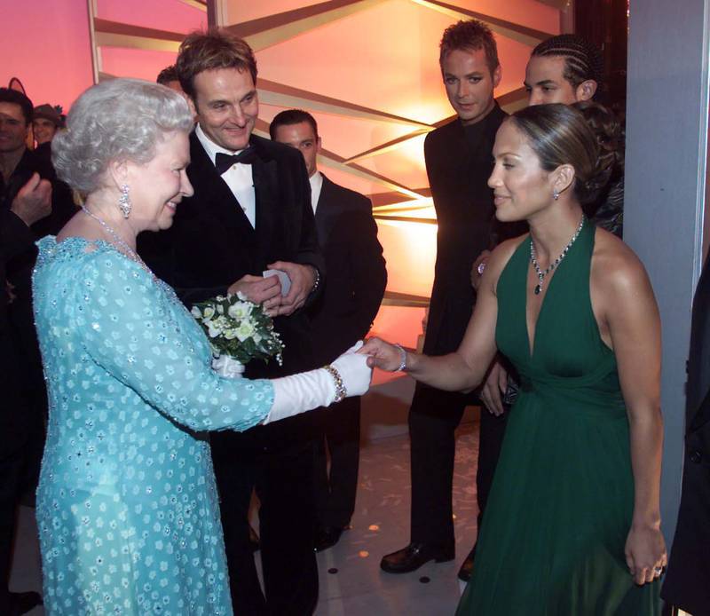 Queen Elizabeth II meets American singer and actress Jennifer Lopez backstage at the Dominion Theatre in London after the Royal Variety Performance in 2001. Getty Images