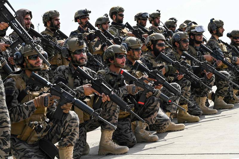 Taliban Badri special force fighters dressed in uniforms, boots, balaclavas and body armour similar to those worn by special forces around the world. AFP