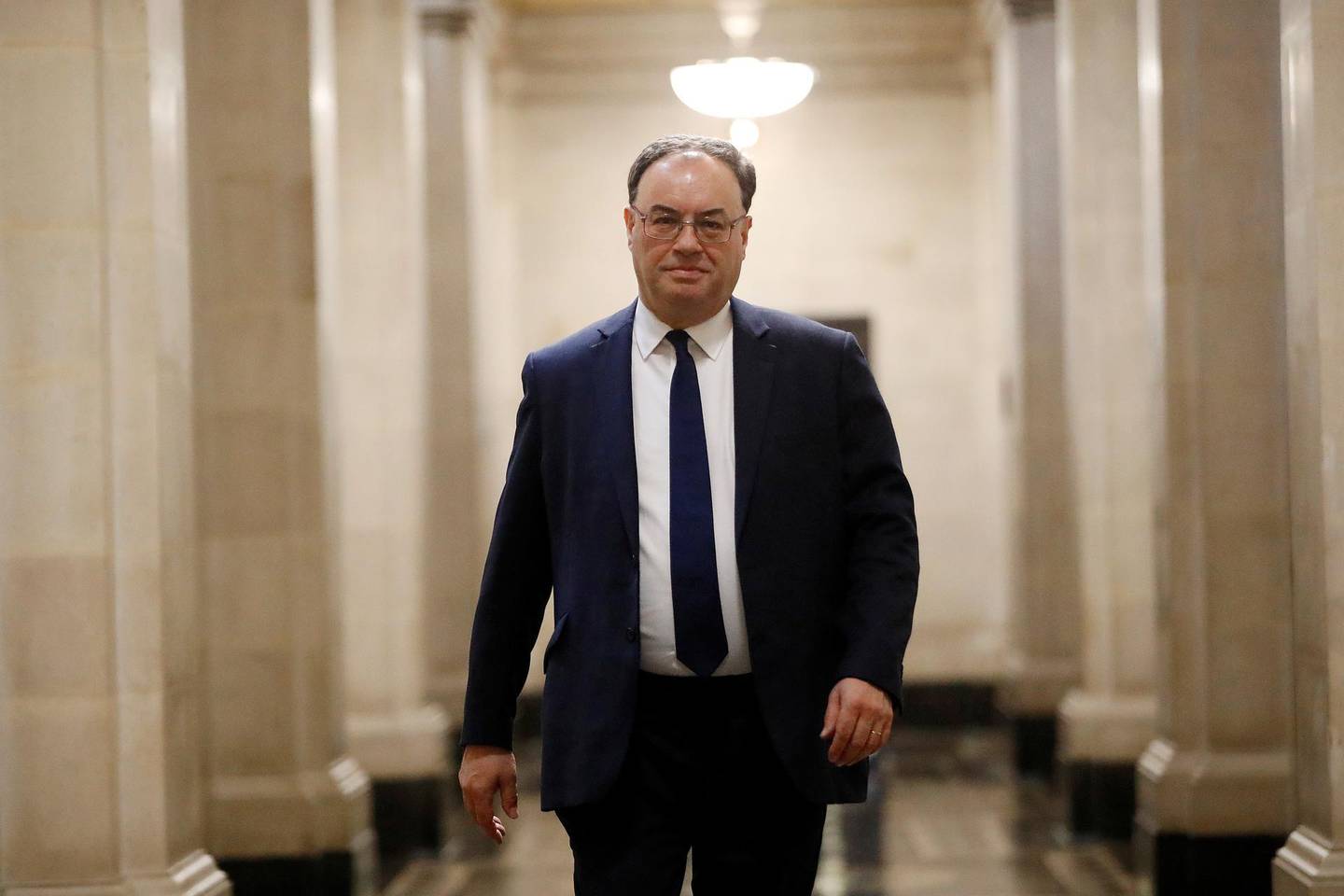 FILE PHOTO: Bank of England Governor Andrew Bailey poses for a photograph on the first day of his new role at the Central Bank in London, Britain March 16, 2020. Tolga Akmen/Pool via REUTERS/File Photo