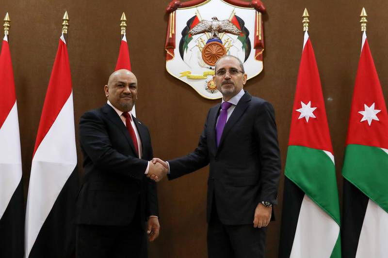 epa07272865 Jordanian Minister of Foreign Affairs and Expatriates Ayman Safadi (R) shakes hand with Yemeni Foreign Minister Khaled Al Yamani, at the Foreign Ministry, in Amman, Jordan, 10 January 2019.  EPA/ANDRE PAIN