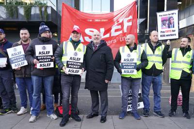Mick Whelan, Aslef general secretary, joins striking rail workers outside London Euston rail station. PA