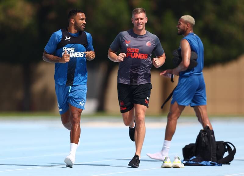 Newcastle striker Callum Wilson, left, is continuing his comeback from injury out in the UAE.