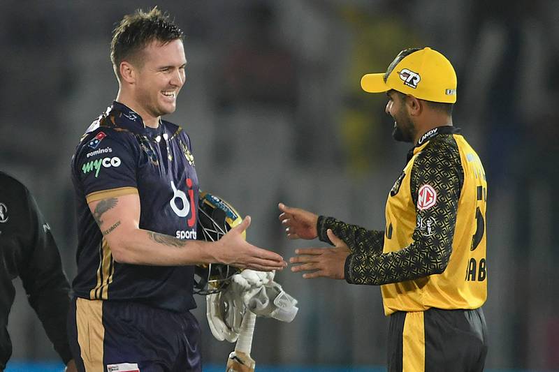 Quetta Gladiators' Jason Roy, left, scored an unbeaten century to complete a record chase against Babar Azam's Peshawar Zalmi in their PSL 2023 match in Rawalpindi on Wednesday, March 8, 2023. AFP