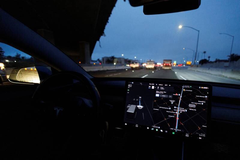 A Tesla Model 3 vehicle drives on autopilot in Westminster, California. Reuters