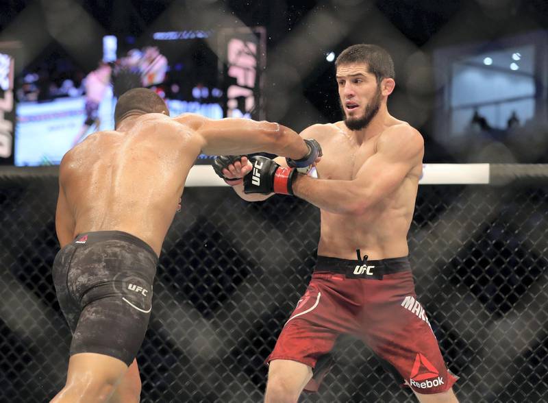 Abu Dhabi, United Arab Emirates - September 07, 2019: Lightweight bout between Davi Ramos and Islam Makhachev (red shorts, winner) in the Main card at UFC 242. Saturday the 7th of September 2019. Yas Island, Abu Dhabi. Chris Whiteoak / The National