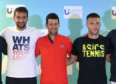 Serbia's Novak Djokovic poses for picture next to Croatia's Marin Cilic and Borna Coric. Reuters