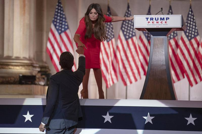 Donald Trump Jr, executive vice president of development and acquisitions for Trump Organisation, left, gives a fist bump to girlfriend Kimberly Guilfoyle, President Donald Trump campaign aide, after speaking during the Republican National Convention at the Andrew W Mellon Auditorium in Washington, DC. Bloomberg