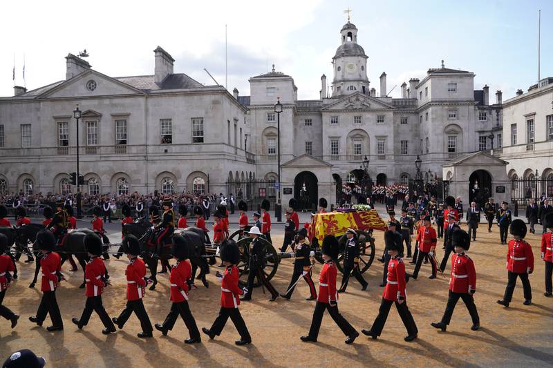 The coffin of Queen Elizabeth is carried on a horse-drawn gun carriage of the King's Troop Royal Horse Artillery. PA