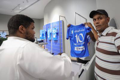 Fans of Saudi club Al Hilal line up to buy club jersey bearing the name and number of Neymar in Riyadh. AFP