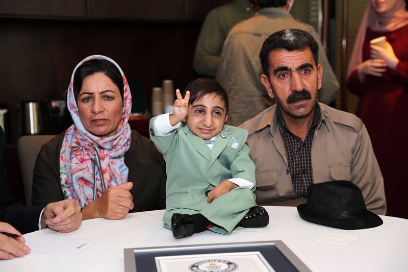 The new record holder attended the Dubai ceremony with his parents 