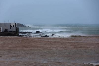 High waves breaking along the shore. Mohammed Mahjoub / AFP Photo