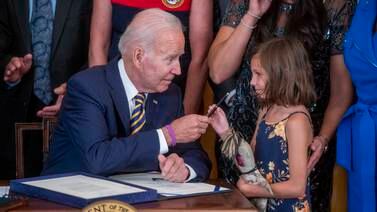 An image that illustrates this article Biden signs toxic exposure bill to expand benefits for veterans