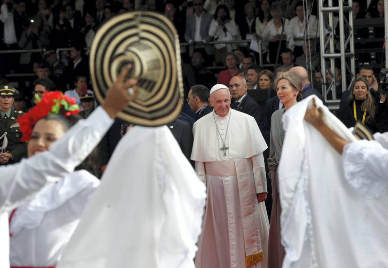 Pope Francis accompanied by Colombia's first lady Maria Clemencia Rodriguez  watches traditional dance upon his arrival in Bogota, Colombia, September 6, 2017. REUTERS /  Stefano Rellandini - RC15A24F1650