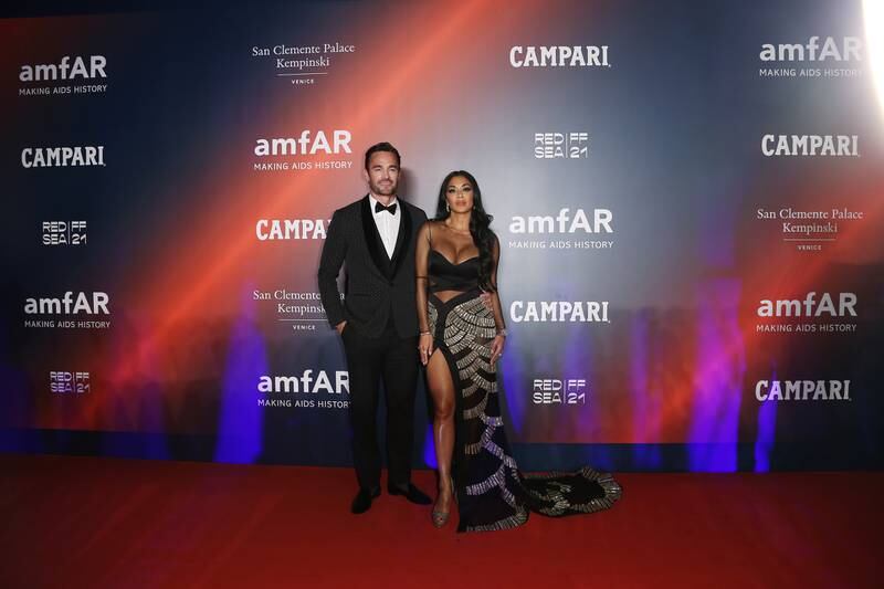 Thom Evans and Nicole Scherzinger are seen at AmfAR event during Venice Film Festival on September 10, 2021. Getty Images